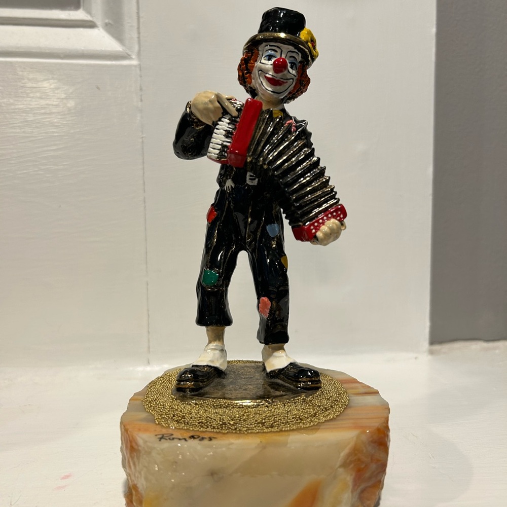 Ron Lee hand-painted collectible clown with accordion.